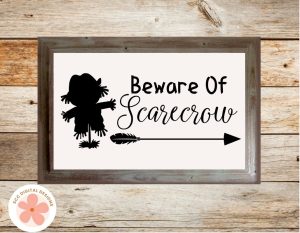 10 Easy Halloween Crafts You Can Make with SVG Files - beware of scarecrow wall art